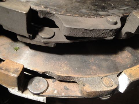 1992 Ford Taurus - Close-up view of a worn clutch assembly, showing the friction disc and pressure plate components.