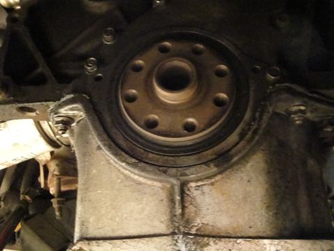 1992 Ford Taurus - Close-up view of an engine's clutch assembly, showing the flywheel and seal.