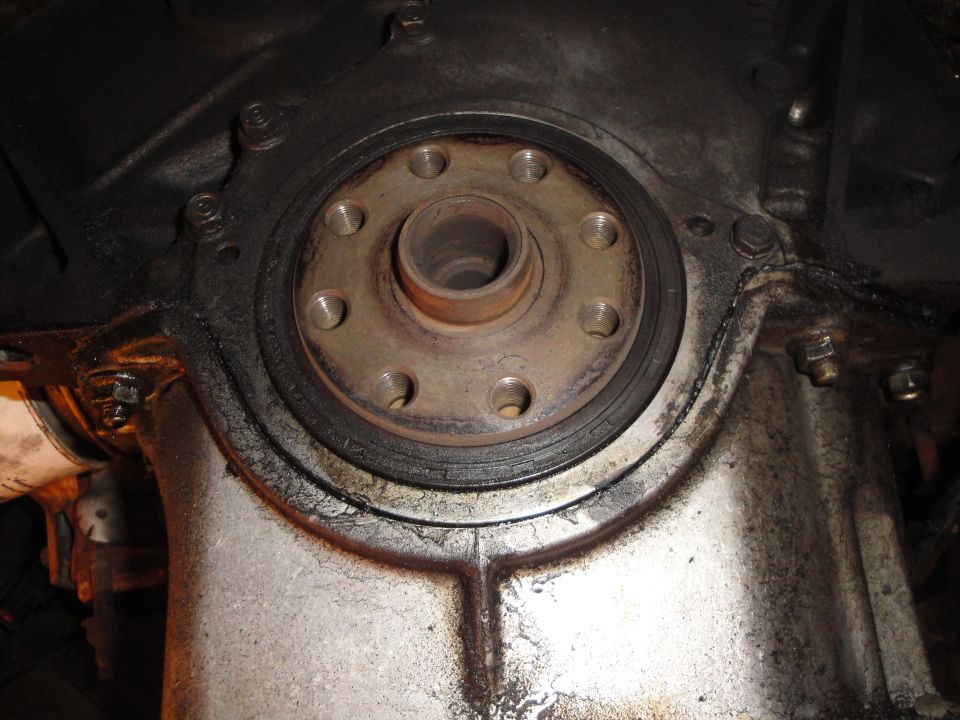 Close-up of a clutch assembly with a bolted flange and seal