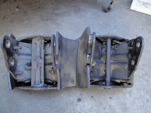 1992 Ford Taurus - This engine mount shows significant wear and tear on its rubber and metal components.