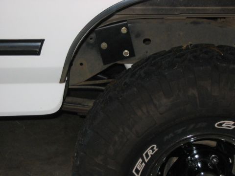 1995 Ford Bronco - New upper rear shock mount. two plates are used. This pic is of the plate attached to the outside of the frame.