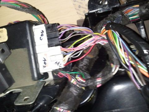 1994 Ford Bronco - Vehicle wiring harness with multiple colored wires and connectors visible.