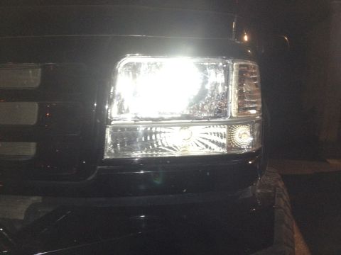 1995 Ford Bronco - Vehicle headlight assembly shown in detail, with a watermark at the bottom.