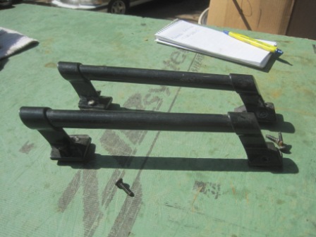 1993 Ford Bronco - These roof rack crossbars are for sale, possibly for a Ford Bronco, but the year is not specified.