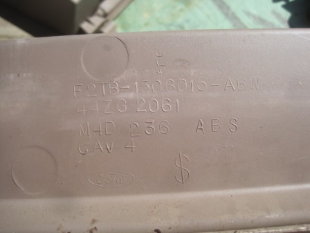 1993 Ford Bronco - This photo shows a vehicle part with embossed Ford branding and part numbers, not a 1993 Ford Bronco.