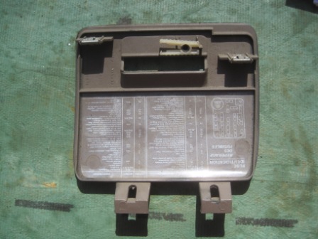 1993 Ford Bronco - Fuse box cover with diagrams and text, likely for an older vehicle.
