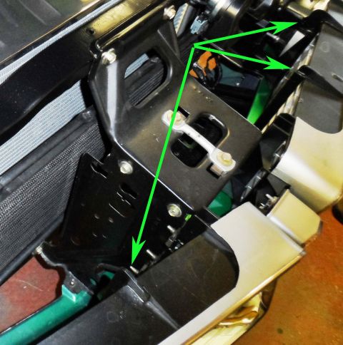 1971 Ford Ranchero - Detail of a car's hood latch assembly, showing mechanical components and mounting points.