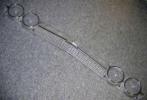 1971 Ford Ranchero - This is a front grille assembly for a 1971 Ford Ranchero, a chrome finish and four circular openings for headlights.