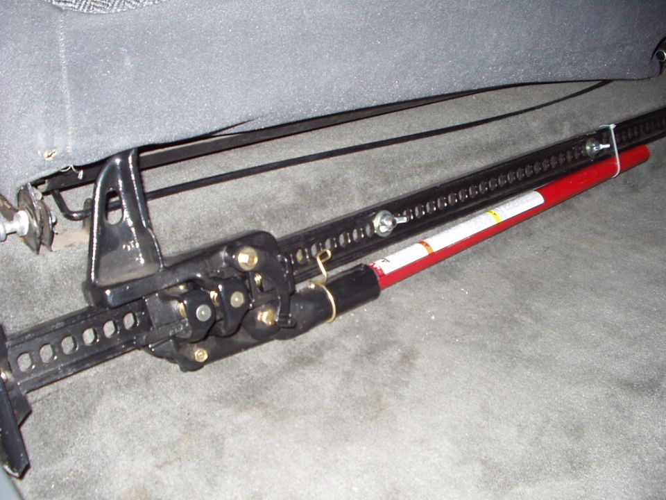 built a bracket that alows a highlift to be mounted to the floor out of the way of the rear passagers feet.
