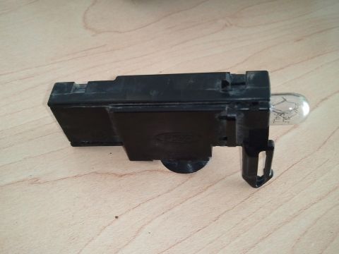 1994 Ford Bronco - This is a Ford underhood light assembly with a glass bulb and embossed Ford logo.