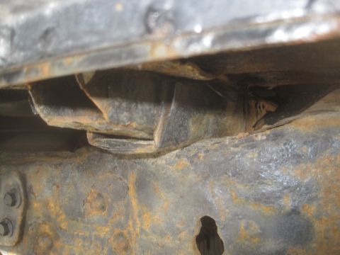 2003 Ford F-350 - Heavily rusted frame components are visible in this close-up shot.