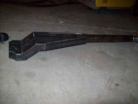 1988 Ford Bronco - Custom fabricated metal part shown on a concrete floor, likely for automotive or industrial use.