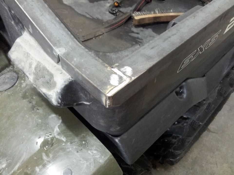 ATV part with metal frame and 'SKY' logo