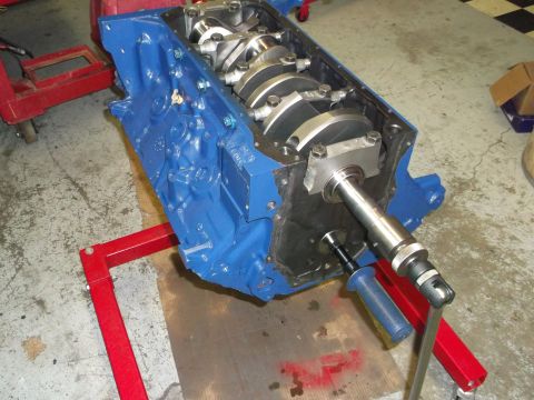 1965 Shelby Cobra - Engine block assembly on a stand, with crankshaft installed.
