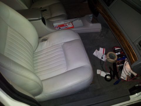 2000 Mercury Grand Marquis - Interior view of a 2000 Mercury Grand Marquis, with wiring and supplies on the passenger side floor.