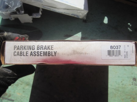 1993 Ford Bronco - A box for a parking brake cable assembly is shown, with no visible vehicle.