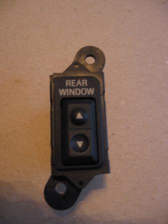 1993 Ford Bronco - This is a rear window switch with up and down buttons.