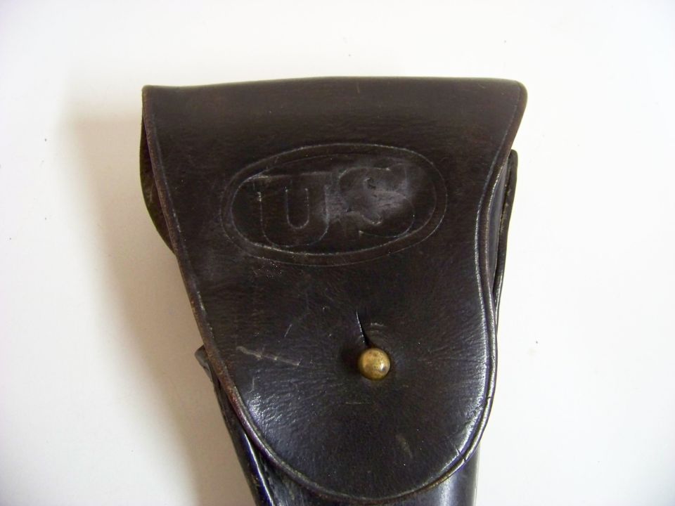 Leather holster with US marking embossed on flap