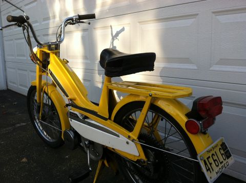 1981 Garelli Rally Sport - This yellow moped features a black seat, rear rack, and a New Jersey license plate.