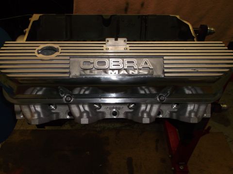 1965 Shelby Cobra - This engine part features prominent 'COBRA' and 'LE MANS' badging.
