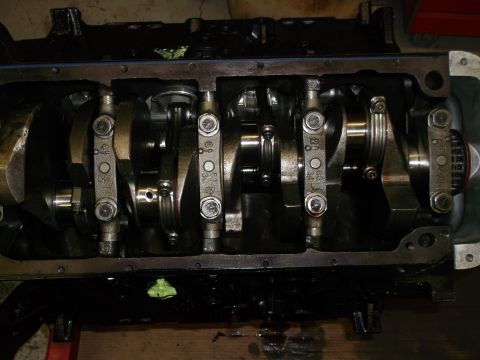 1965 Shelby Cobra - Close-up view of an engine block's internal components, including the crankshaft and connecting rods.