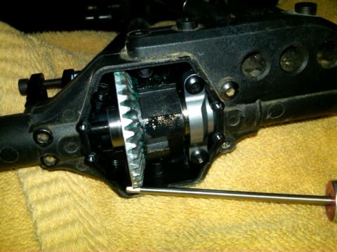 1986 Ford Bronco - Close-up of an RC car's differential assembly, showing internal gears and lubrication.