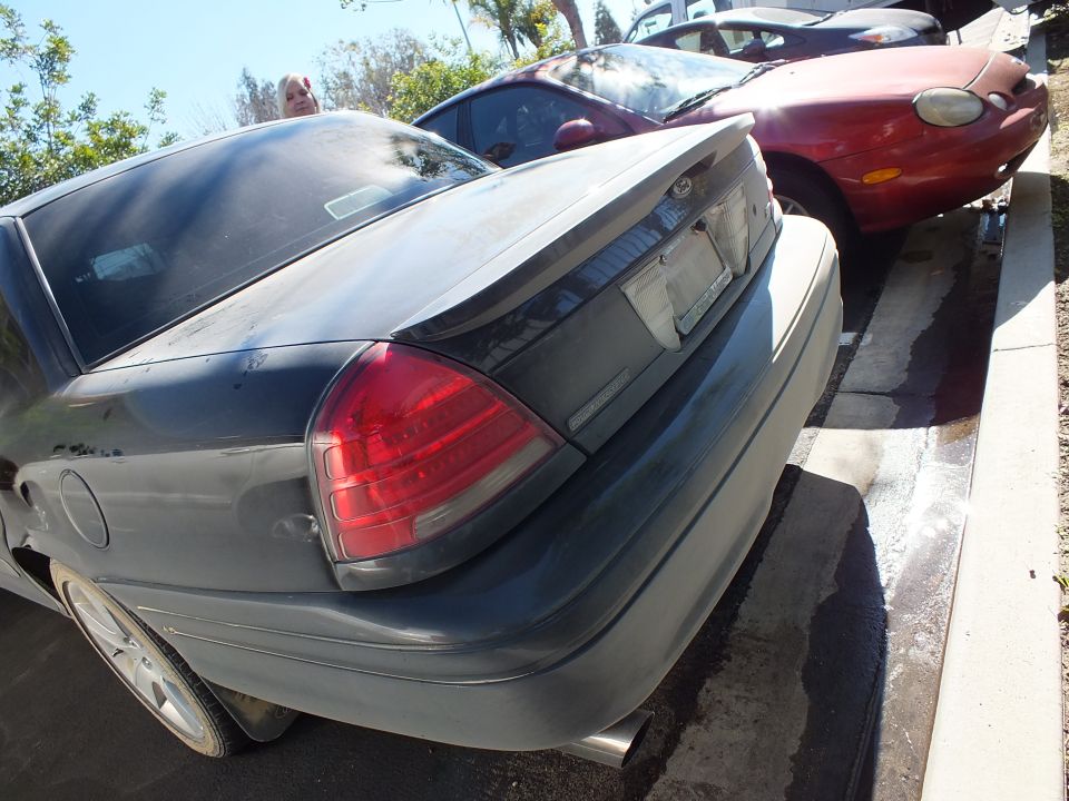 Ford Crown Victoria rear deck with oval badge, spoiler and tail light