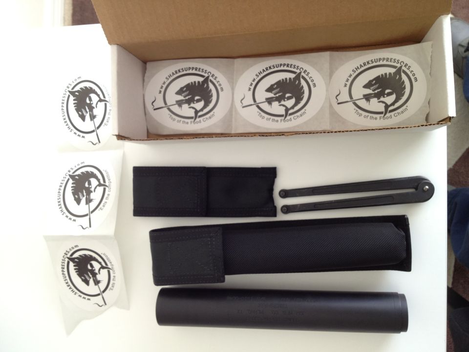 Gun suppressor kit with stickers and carrying pouches