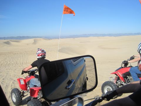1989 Ford Bronco - Riding ATVs through the sand dunes on a sunny day.