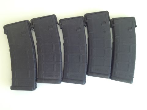2013 Ford Mustang - Five black rifle magazines are displayed on a white background, with some text visible on their sides.