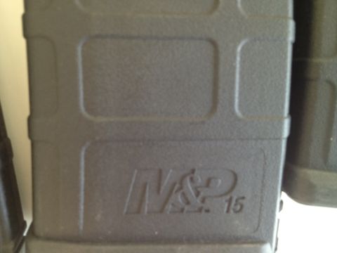 2013 Ford Mustang - Black gun magazine with M&P 15 marking.