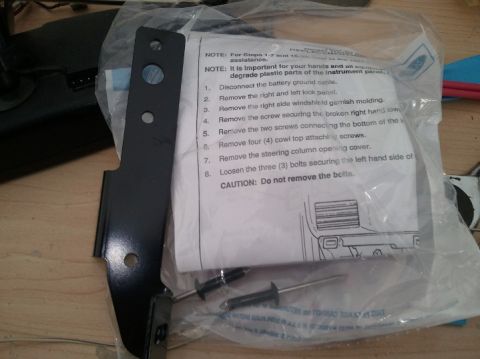 1994 Ford Bronco - This photo shows a vehicle interior mounting bracket and its installation instructions.