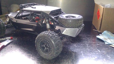 1996 Ford Bronco - This custom-built buggy features a roll cage and a spare tire mounted on the rear.