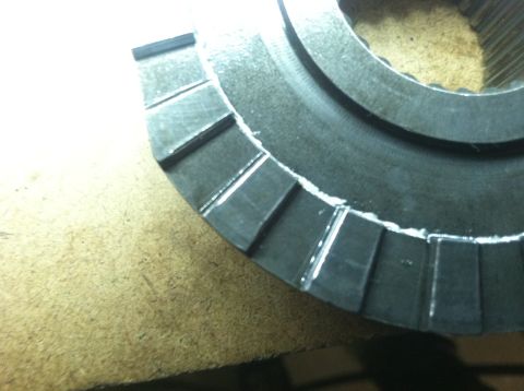 1985 Toyota Pickup/SR5 - This is a close-up of a metal gear part, not a 1985 Toyota Pickup/SR5.