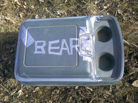 1990 Ford Bronco - This is a vehicle interior part, possibly a center console, with the word BEAR written on it in tape.