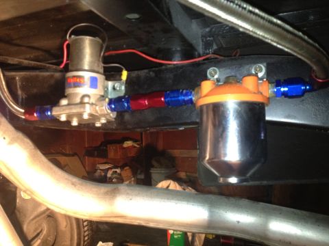 1972 Ford Ranchero - Close-up view of an aftermarket fuel pump and filter system installed on a vehicle.