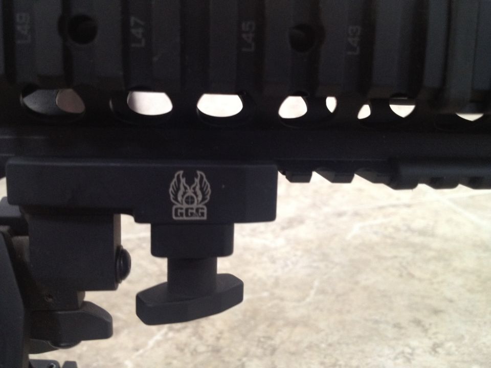 Black rail system with GGG logo and mounting hardware, close-up view