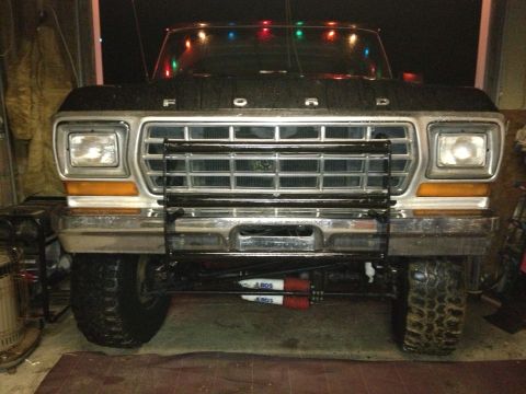 1979 Ford Bronco - Front view of a 1979 Ford Bronco, decorated with Christmas lights on the windshield.
