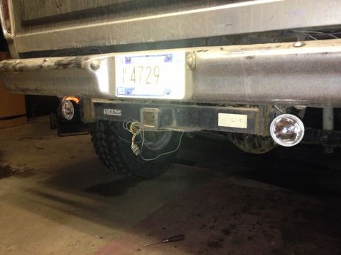 1979 Ford Bronco - The rear of a vehicle is shown, a trailer hitch and a license plate with the number 'Y 4729'.