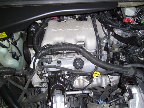 2005 Chevrolet Venture - Close-up view of the 3400 SFI V6 engine in a 2005 Chevrolet Venture, highlighting various components and wiring.