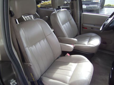 2005 Chevrolet Venture - Interior view of a vehicle's front seats and dashboard.