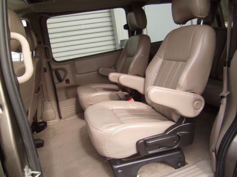 2005 Chevrolet Venture - The interior of a 2005 Chevrolet Venture minivan, two rows of captain's chairs.