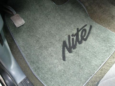 1994 Ford Bronco - The interior of a 1994 Ford Bronco features a floor mat with the "Nite" edition logo.
