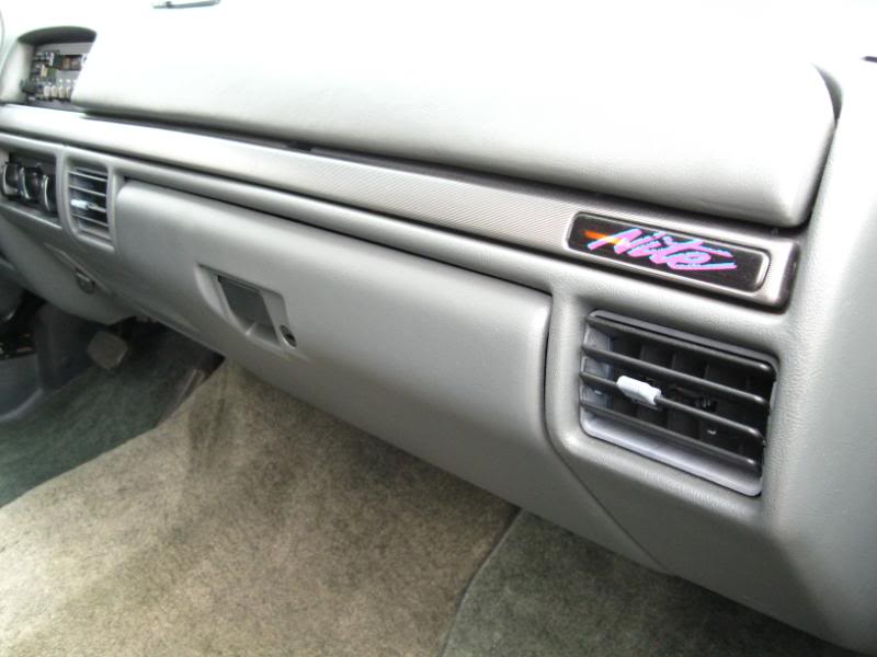 Dashboard interior with a "Nite" badge and air vents