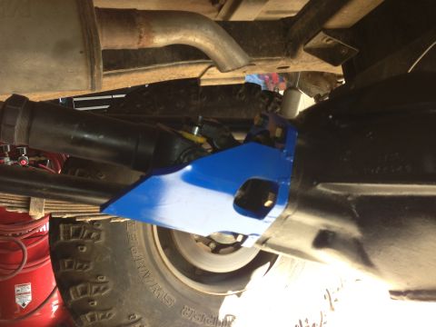 1971 Ford Bronco - Close-up view of the undercarriage components, including a bright blue suspension part.