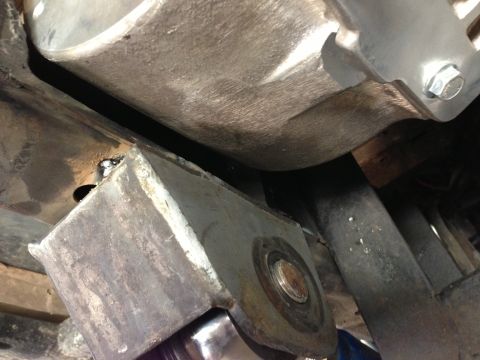 1971 Ford Bronco - Detail shot of the undercarriage, focusing on suspension and frame elements.