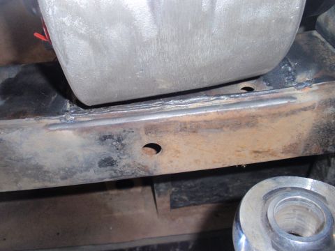 1971 Ford Bronco - Detail of a vehicle's frame and suspension components, showing signs of rust and wear.