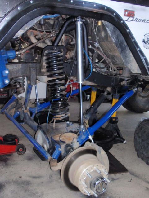 1971 Ford Bronco - Close-up of a 1971 Ford Bronco's modified front suspension system.