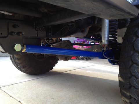 1971 Ford Bronco - Custom suspension parts are visible on the underside of a vehicle.