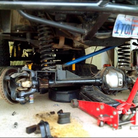 1971 Ford Bronco - Underbody view of suspension and axle components, likely during maintenance or modification.